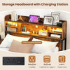 Full size bed frame with rustic brown headboard, LED lights, and charging station featuring two outlets and a USB port.