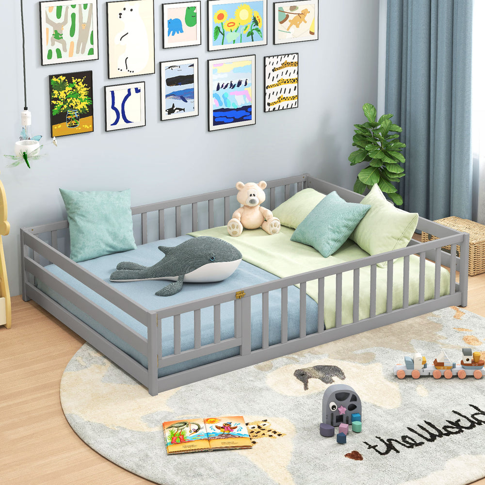Full-size gray floor bed with safety guardrails, solid wood frame, and low-to-ground design for kids' comfort and.