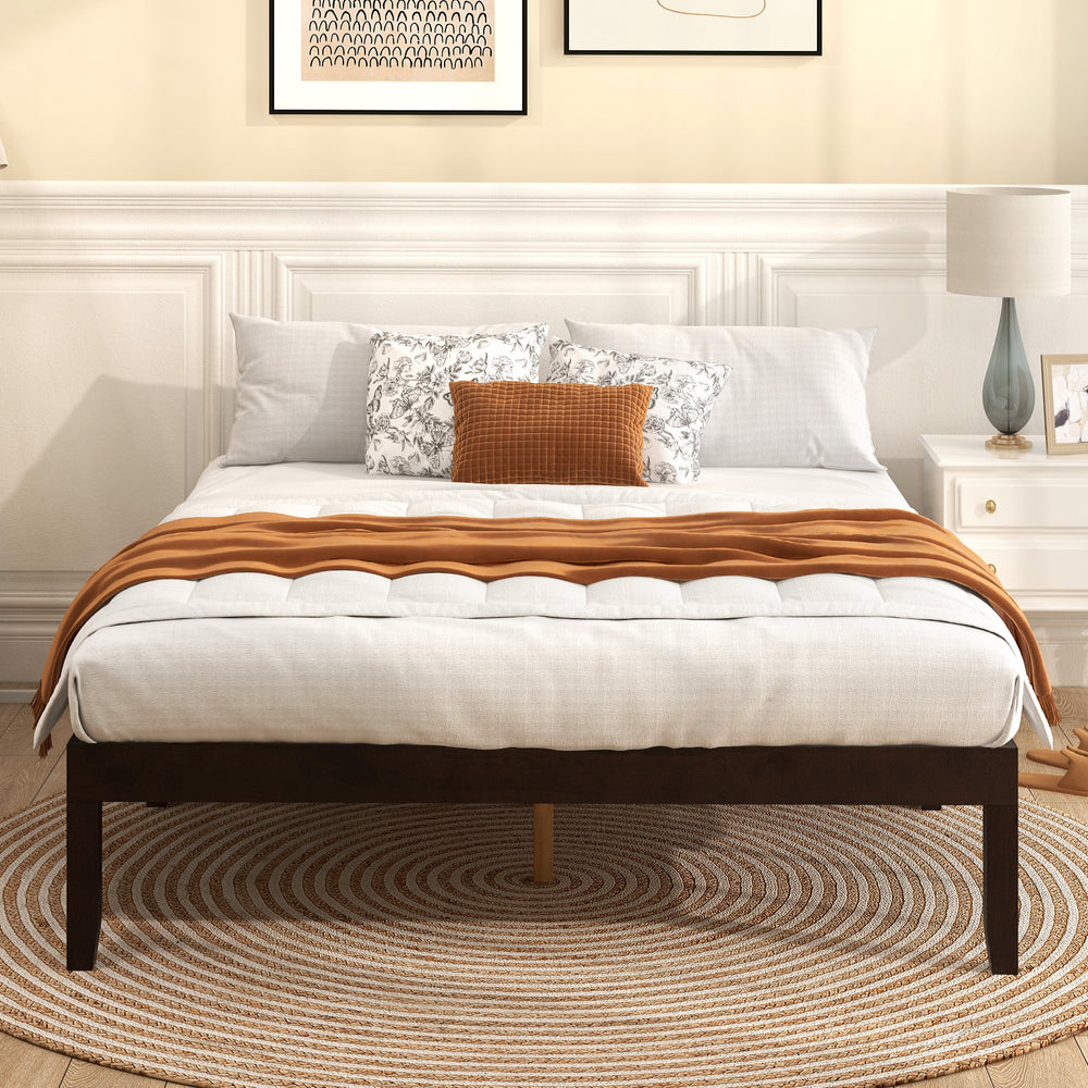 Full size wood bed frame in espresso showcasing a minimalist design and ample under-bed space for storage solutions.