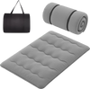 Full-size futon mattress with a washable cover, rolled up with a carry bag for easy storage and transportation.