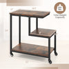 G-shaped side table with rustic brown finish, featuring 3 tiers and wheels for mobility, ideal for living room or.