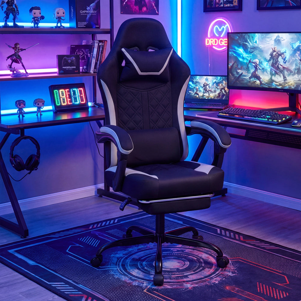 Height adjustable gaming chair in black with ergonomic design, headrest, footrest, and 360° swivel for optimal comfort.