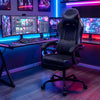 Height adjustable black gaming chair with headrest and lumbar support, perfect for long gaming sessions in a modern.