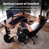 Gaming chair with adjustable height, detachable headrest, and lumbar support, designed for comfort during long gaming.