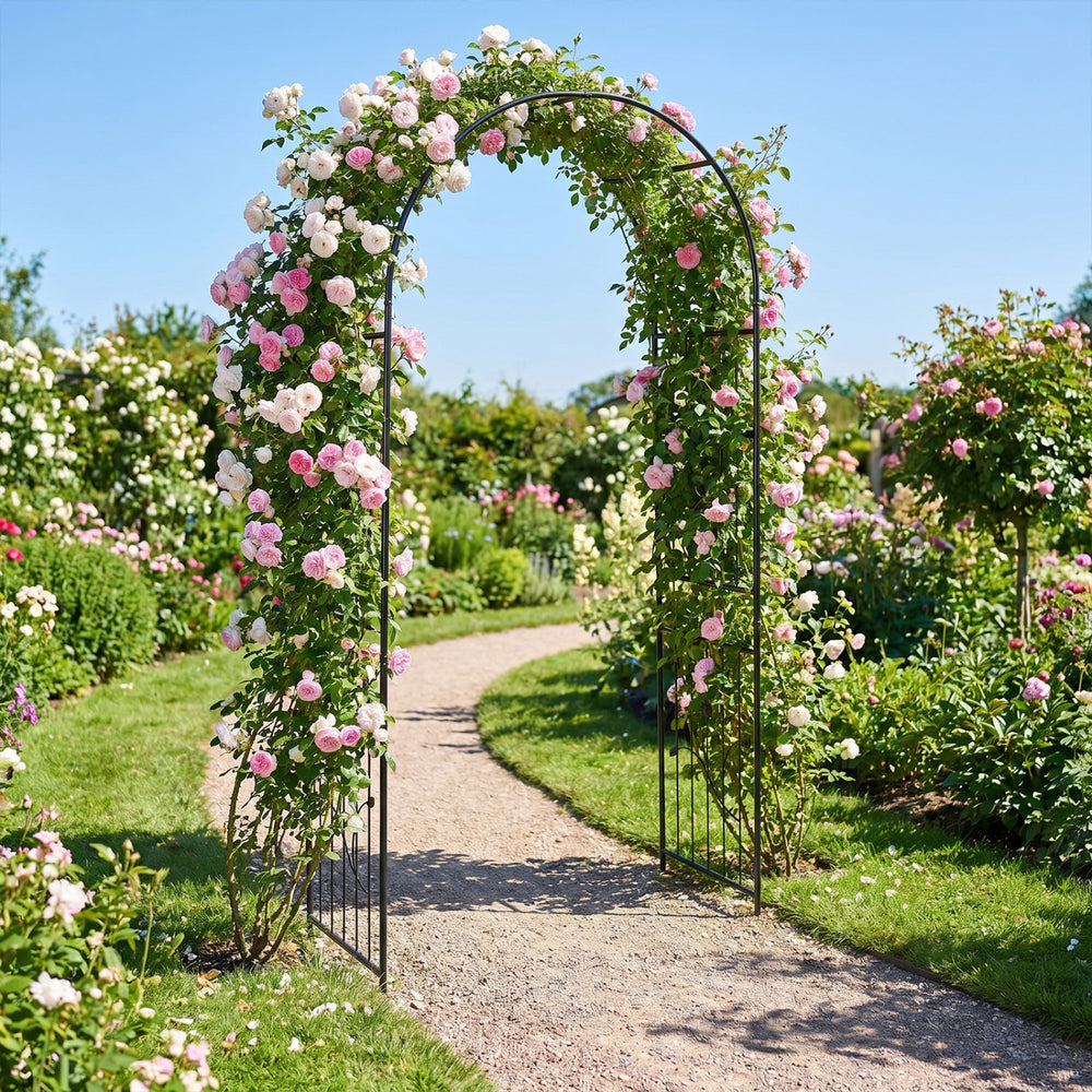 Heavy-duty metal garden arch with pink flowers, 87 inches tall, perfect for climbing plants and enhancing outdoor.