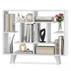 Geometric white bookshelf showcasing decorative items and books, designed for stylish storage in any interior space.