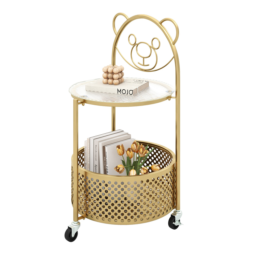 Modern gold sofa side table with bear pattern, tempered glass top, and metal storage basket on lockable wheels.