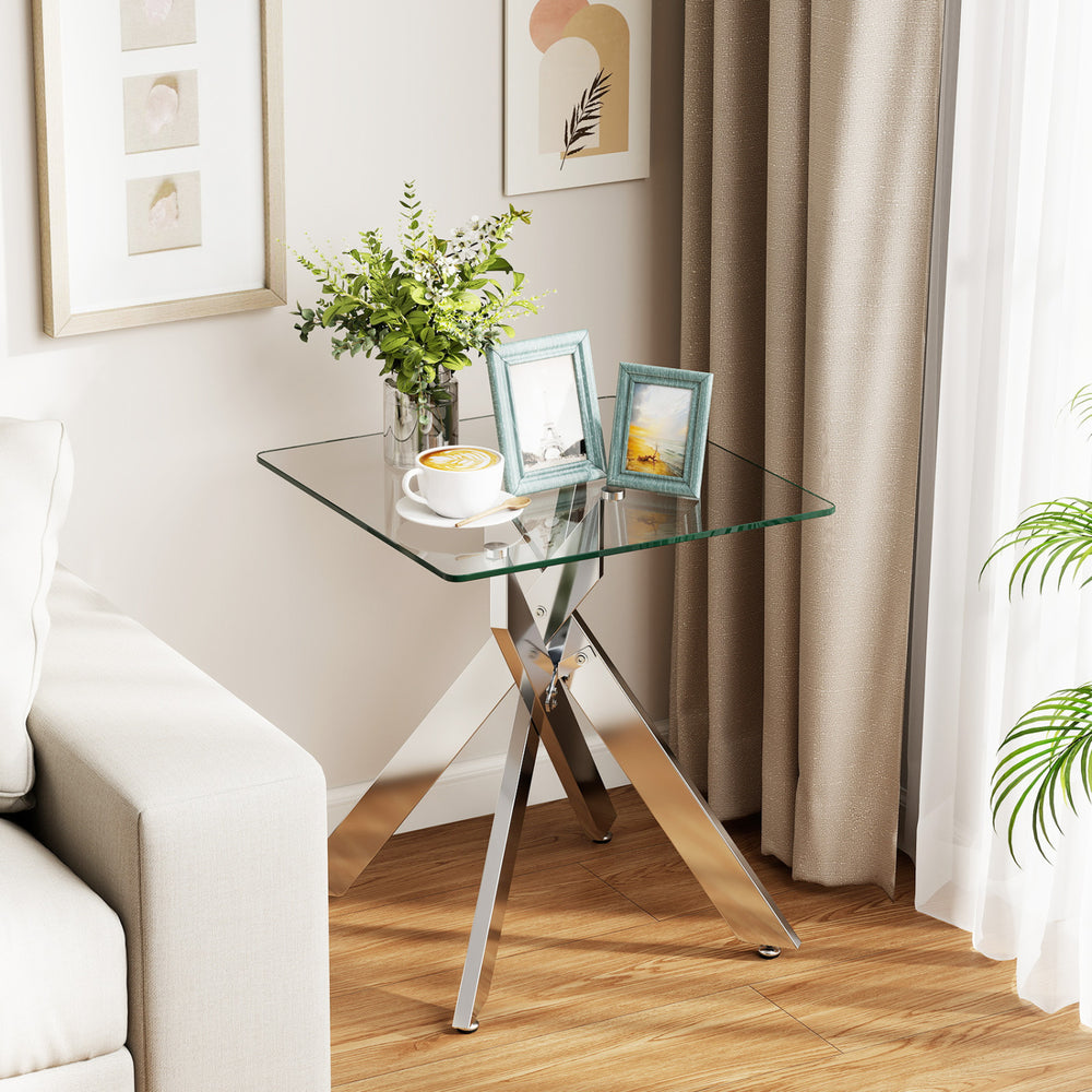 Square glass side table with tempered glass top and silver metal X base, perfect as a side table or nightstand.