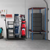 Double golf bag organizer with lockable wheels, featuring shelves and hooks for accessories, ideal for garage storage.