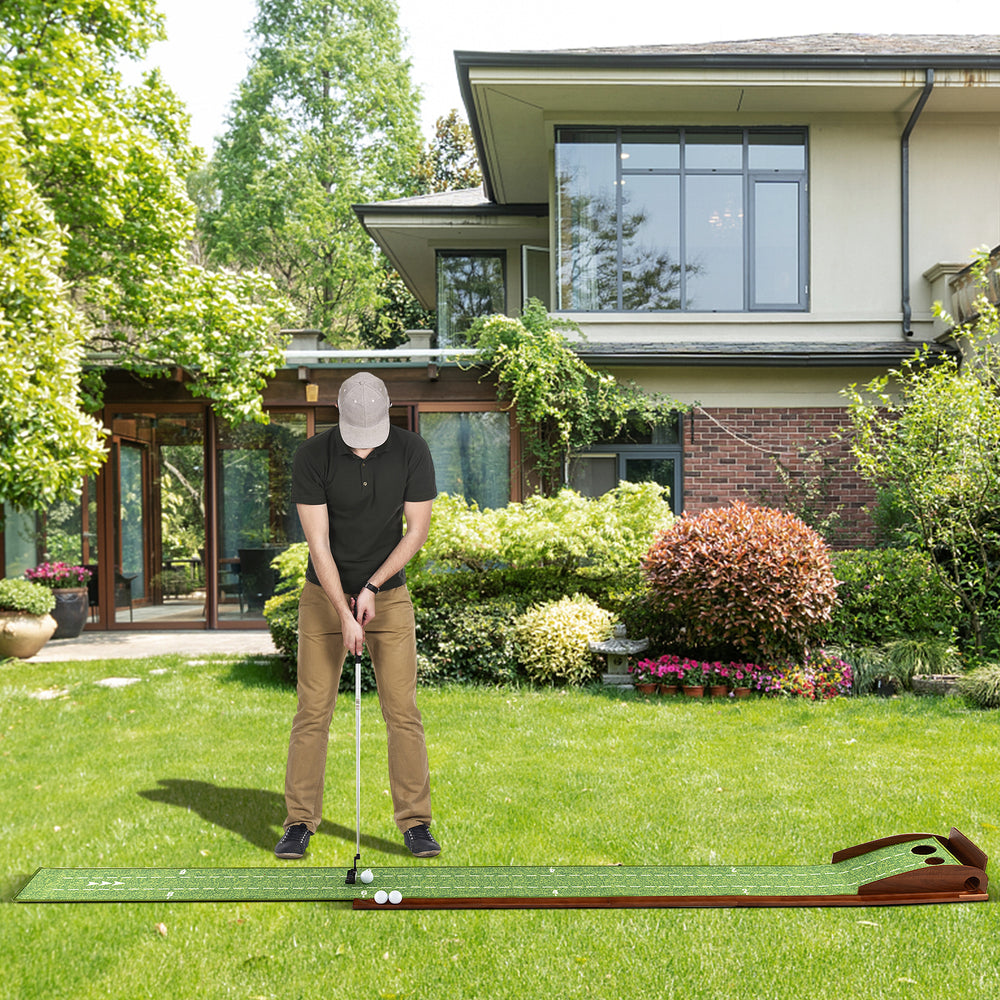 Golf putting mat with auto ball return, featuring two hole sizes and premium nylon surface for practice in a backyard.