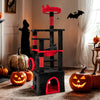 Gothic cat tree in black and red with plush perch, hammock, and dangling spider toy for feline play and relaxation.