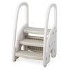 Gray 3-step stool featuring removable top pedal and wide non-slip pedals, perfect for toddlers’ height adjustments and.