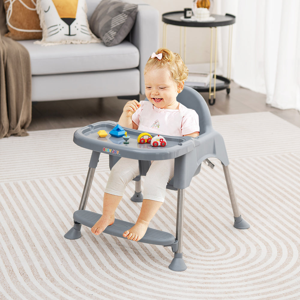 Convertible gray baby high chair with removable double tray, featuring safety harness and easy-to-clean waterproof seat.