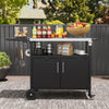 Outdoor grill cart with a folding stainless steel top, featuring storage, wheels, and accessories for outdoor parties.