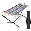 Multicolor hammock with heavy-duty metal stand, carrying case, and hand-woven ropes for outdoor relaxation.
