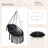 Hanging hammock chair in black with soft cushions, sturdy rope chain, and elegant tassels for indoor and outdoor use.
