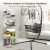 Hanging swing chair with gray cushions and metal stand, ideal for indoor and outdoor relaxation.