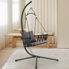 Gray hanging swing chair with stand, featuring soft cushions and a reinforced metal frame for indoor and outdoor use.