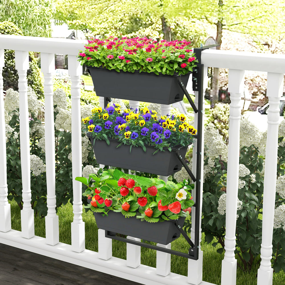 Hanging vertical planter with three detachable boxes, adjustable hooks, and a sturdy black metal frame for outdoor use.