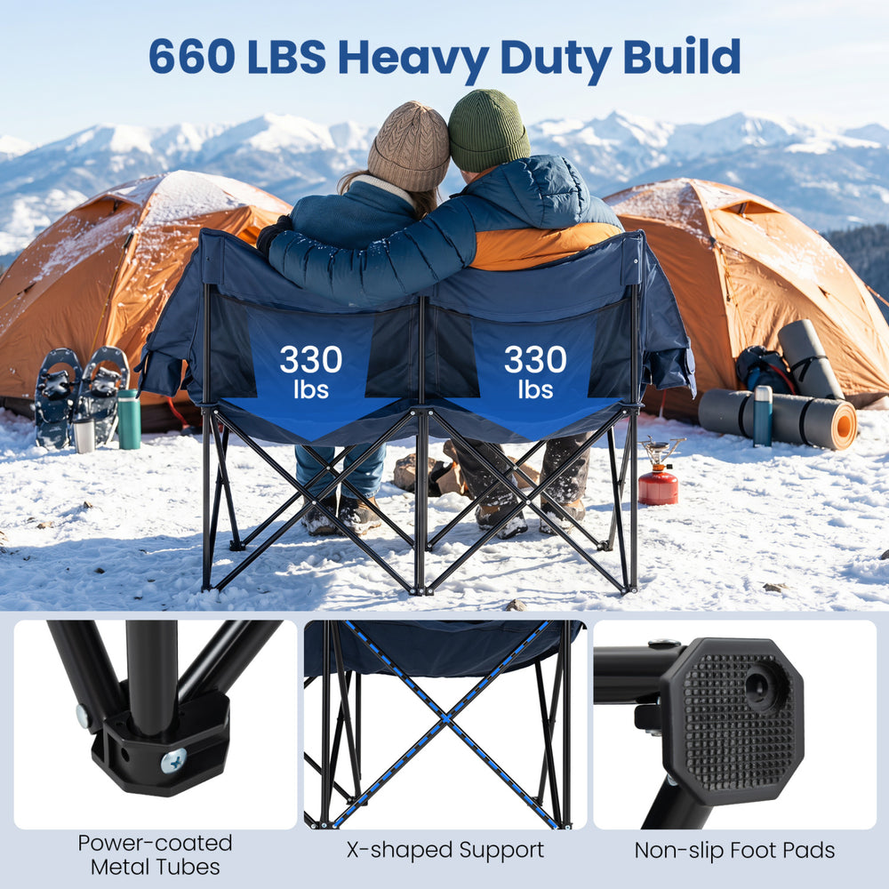 Heated double camping chair in navy with 4 heating zones, sturdy metal frame, and wine glass holders for outdoor comfort.