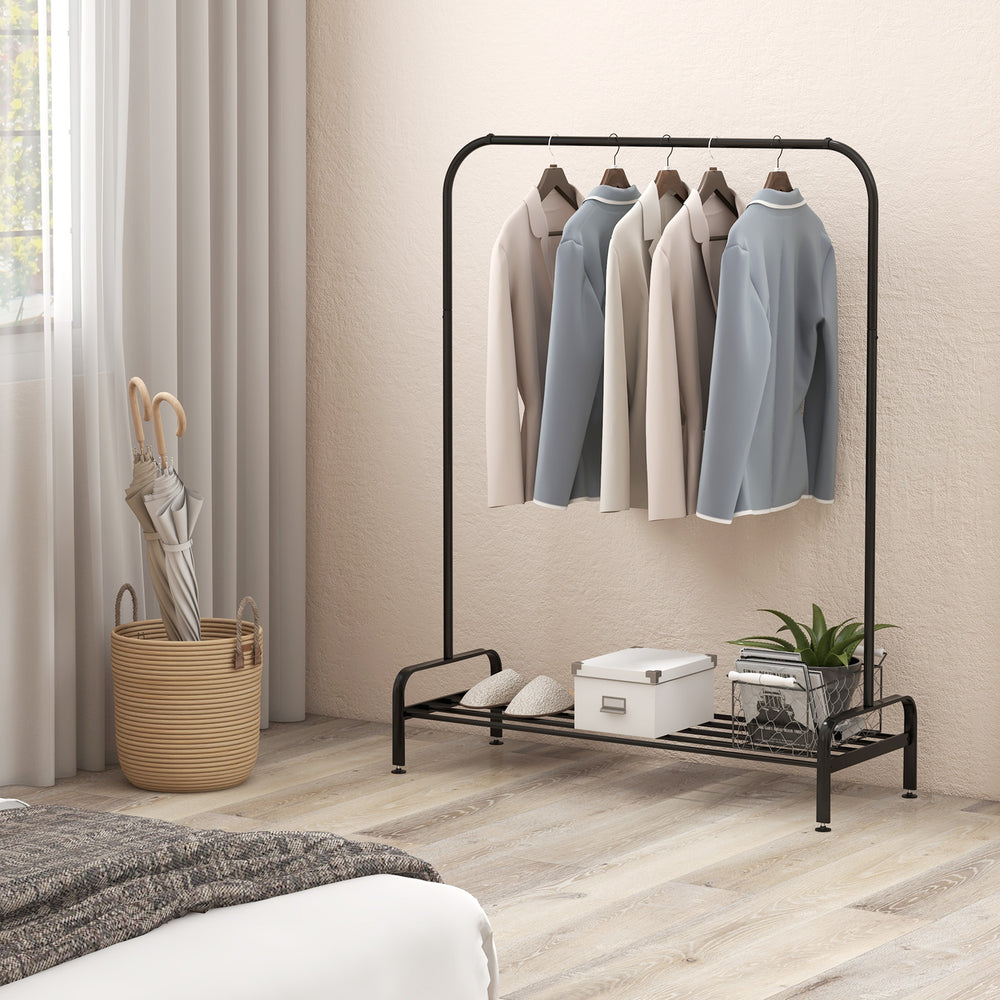 Heavy duty clothes stand rack with top rod and lower storage shelf, ideal for organizing garments in any room.