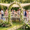 Heavy-duty bronze metal garden arch with gate, featuring a classic design, perfect for outdoor events and supporting.