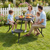 Round black picnic table for 4 with iron seats, featuring an umbrella hole, perfect for outdoor family gatherings.