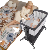 Height adjustable bedside sleeper in gray with soft mattress, featuring a storage bag and breathable mesh for baby.