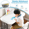 Height adjustable kids table with tiltable whiteboard, perfect for drawing and studying in a playroom or kid's room.