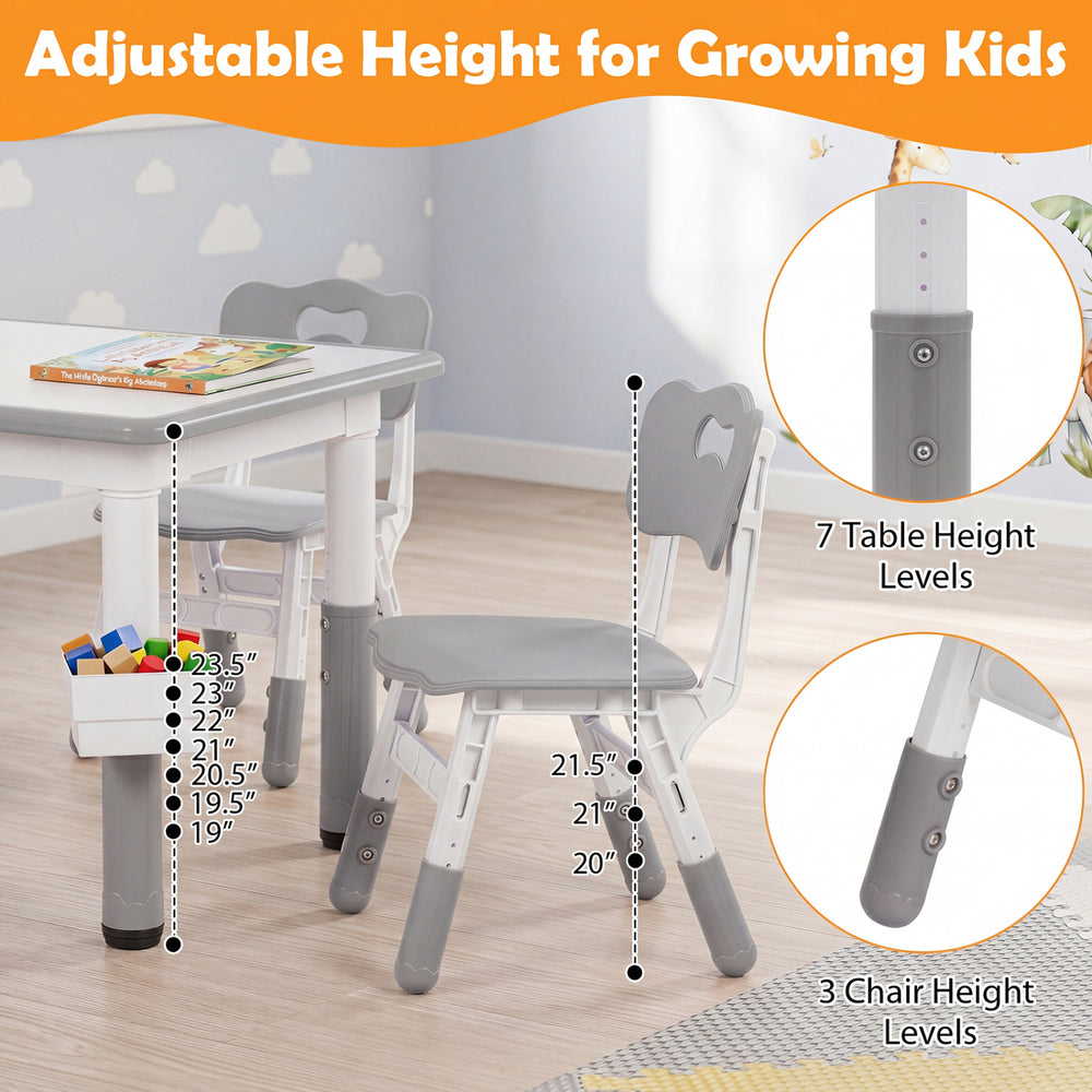 Height adjustable kids table and four chairs set in gray with graffiti desktop, ideal for drawing and studying.