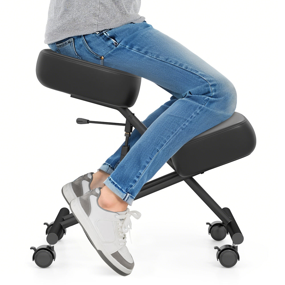 Height adjustable kneeling chair with thick padded cushions for posture correction, shown in use with a person seated.