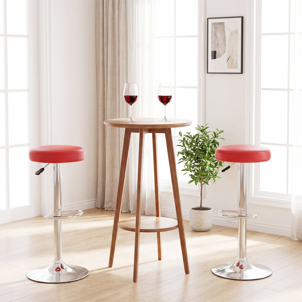 Height-adjustable red bar stools with 360° swivel and soft PU leather, perfect for modern kitchens and dining areas.