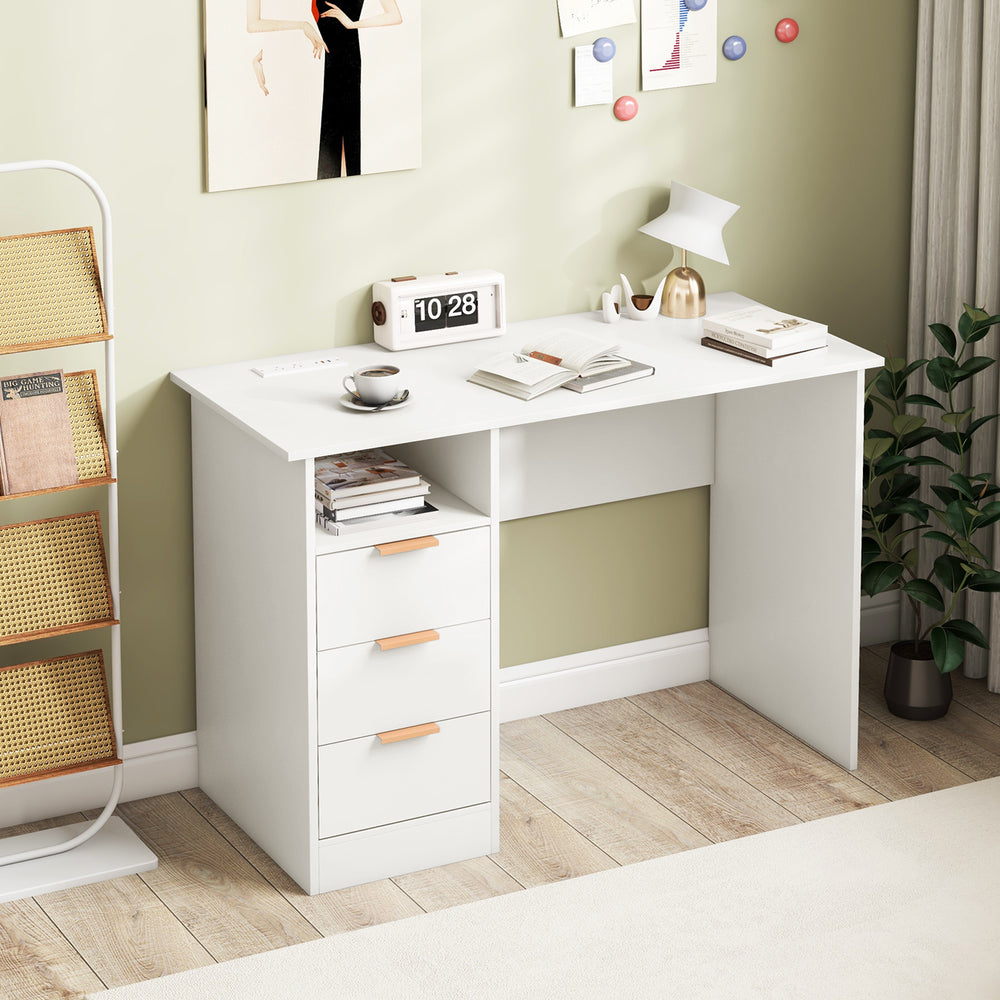 Home office desk in white with 3 storage drawers, open shelf, and built-in power outlet for convenient charging.