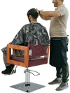 Hydraulic barber chair in red with 360-degree swivel, adjustable headrest, and high-density sponge padding for comfort.