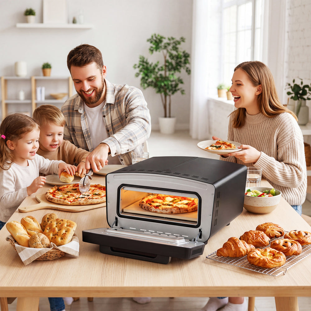 Indoor electric pizza oven in black with dual heating zones, 850℉ max temperature, perfect for family gatherings.