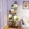 Tall 8-tier indoor plant stand with grow lights, ideal for displaying potted plants and decor in living rooms or.