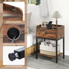 Industrial bedside table nightstand in rustic brown with charging station, cable management, and adjustable foot pads.