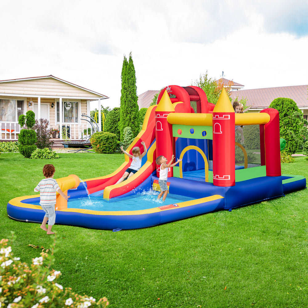 Inflatable bounce castle with water slide and splash pool, featuring safety handrails and colorful ocean balls for.
