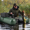 Inflatable fishing float tube in green with angling base, featuring a fish ruler and storage pockets for gear.
