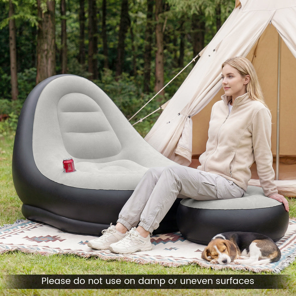Inflatable lounge sofa with ottoman in grey, featuring a flocked surface, perfect for outdoor relaxation and camping.
