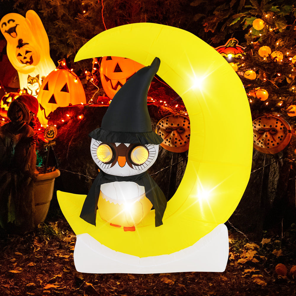 Charming inflatable owl in a wizard hat on a glowing crescent moon, featuring eye-catching LED lights for Halloween.