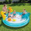 Children enjoying the Outdoor Summer Water Park with seahorse sprinkler, slide, and marine life toys in a backyard.