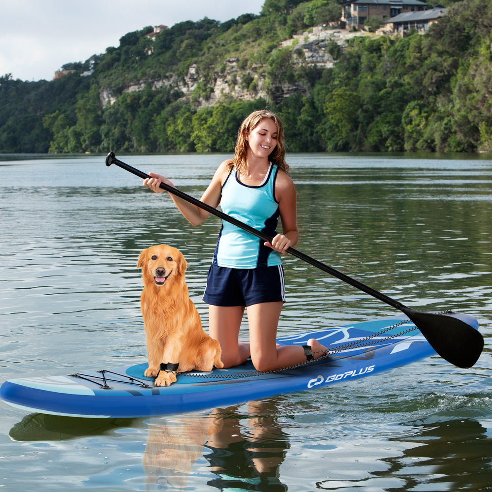 Inflatable stand up paddle board with a non-slip EVA pad, adjustable paddle, and a dog on board for outdoor fun.