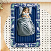 Inflatable toddler travel bed in blue with raised bed rails, soft flocking surface, and electric pump for easy setup.