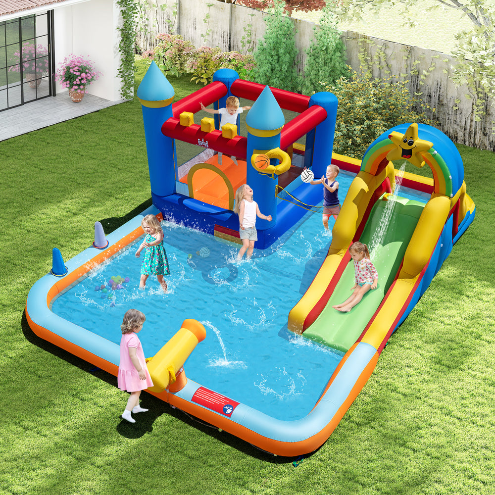Colorful inflatable water slide park featuring a bouncy castle, climbing wall, and splash pool for kids' outdoor fun.