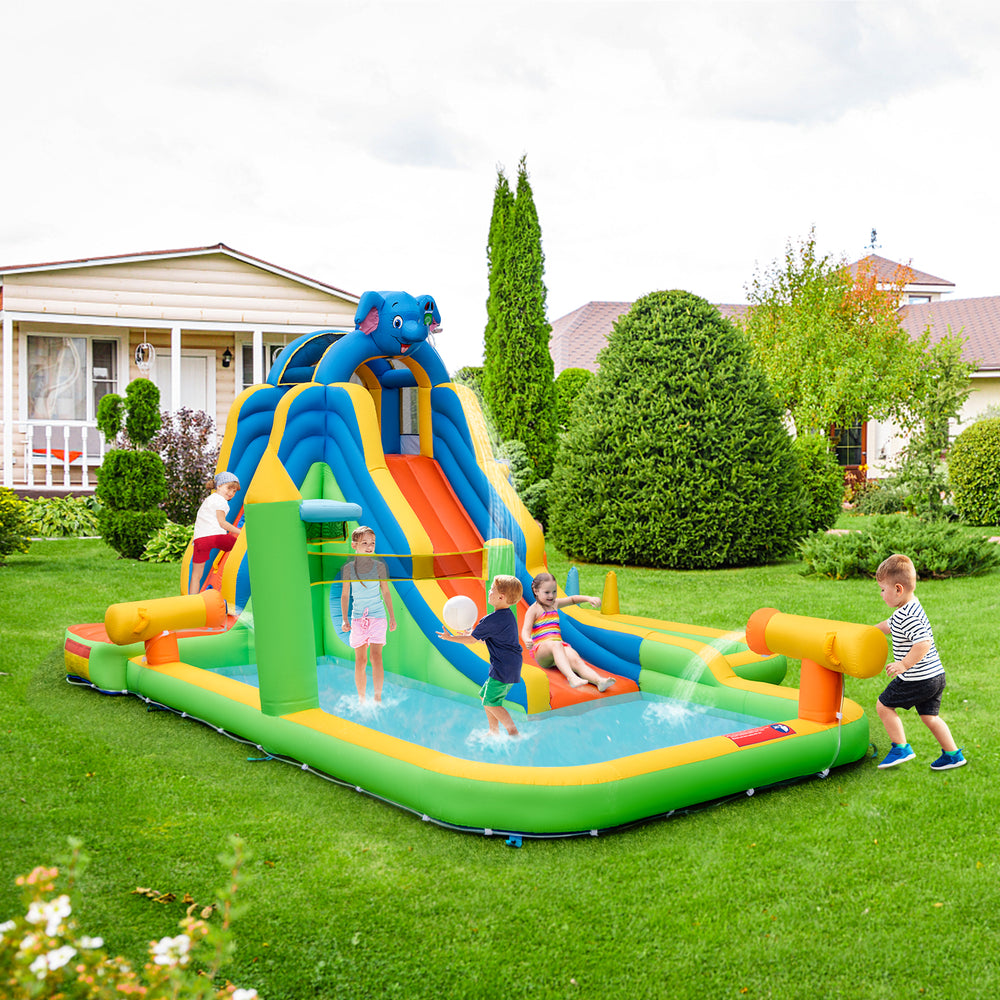 Giant inflatable water slide for kids featuring a climbing wall, water cannons, and a splash pool for backyard fun.