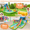 Giant inflatable water slide with climbing wall and dual water cannons for kids' backyard fun during summer festivals.
