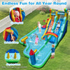 Giant inflatable water slide park featuring double slides, climbing wall, and splash pool for summer fun in the.
