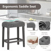 Gray saddle bar stool with padded seat, 4.5" thick cushion, and solid rubber wood frame for ergonomic comfort.