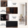 Full-length mirror jewelry armoire in rustic brown with lockable design, sturdy metal hinge, and internal velvet lining.